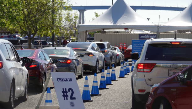 Cars queue at San Diego's Covid-19 Vaccination Super Station stock photo