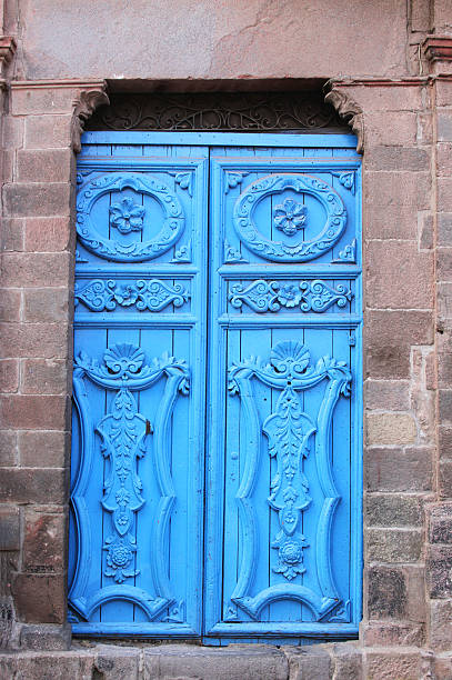 Carved Blue Door, Cuzco, Peru stock photo