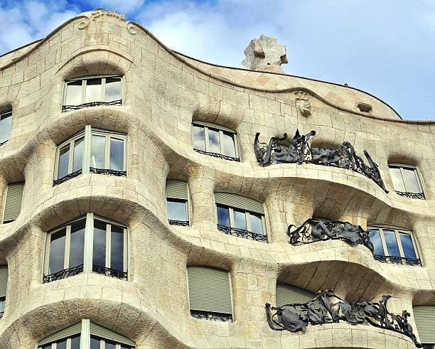 Casa Mila, Barcelona Barcelona, Spain - December 16, 2014: Facade of the Casa Mila by Gaudi in Barcelona on December 16, 2014. Barcelona is the capital city of Catalonia, Spain.  casa milà stock pictures, royalty-free photos & images