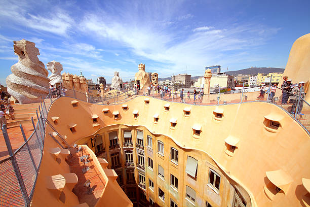 Casa Mila or La Pedrera Barcelona, Spain - May 7, 2013: Casa Mila or La Pedrera on May 7, 2013 in Barcelona, Spain. This famous building was designed by Antoni Gaudi and is one of the most visited of the city.  casa mil�� stock pictures, royalty-free photos & images