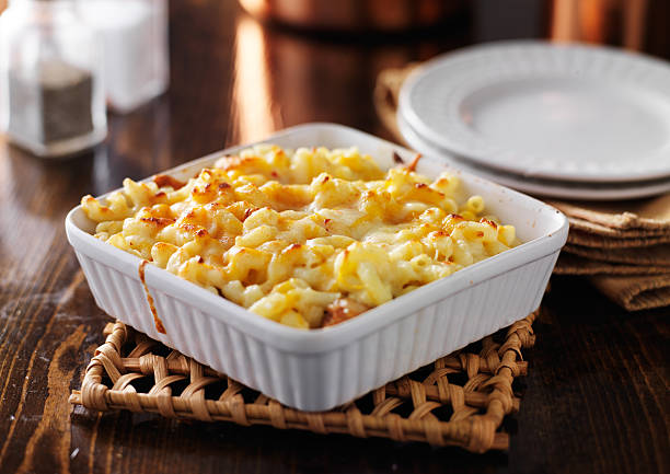 casserole dish with baked macaroni and cheese stock photo