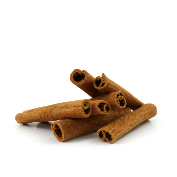 PILE OF SPICES - Cassia Cinnamon Sticks or Quills stock photo