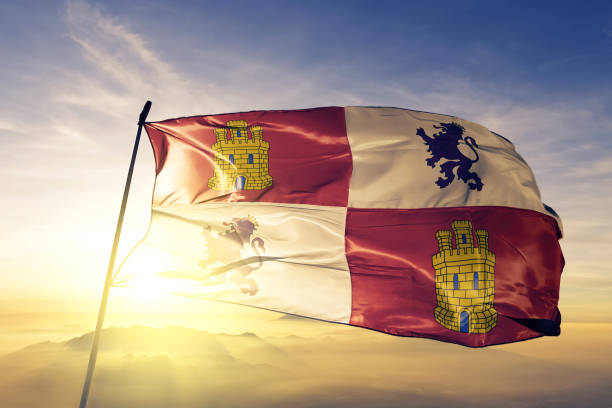 Castile and Leon autonomous community of Spain flag textile cloth fabric waving on the top sunrise mist fog Castile and Leon autonomous community of Spain flag on flagpole textile cloth fabric waving on the top sunrise mist fog castilla y león stock pictures, royalty-free photos & images