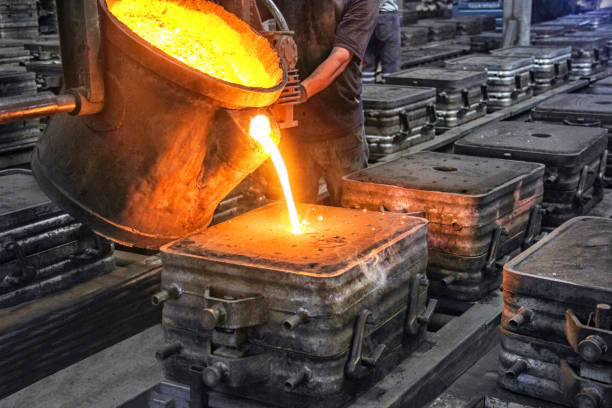 Casting and foundry. Casting is the process from which solid metal shapes (castings) are produced by filling voids in molds with liquid metal.  Patternmaking is the process for producing these patterns. Casting and foundry. Casting is the process from which solid metal shapes (castings) are produced by filling voids in molds with liquid metal.  Patternmaking is the process for producing these patterns. alloy stock pictures, royalty-free photos & images