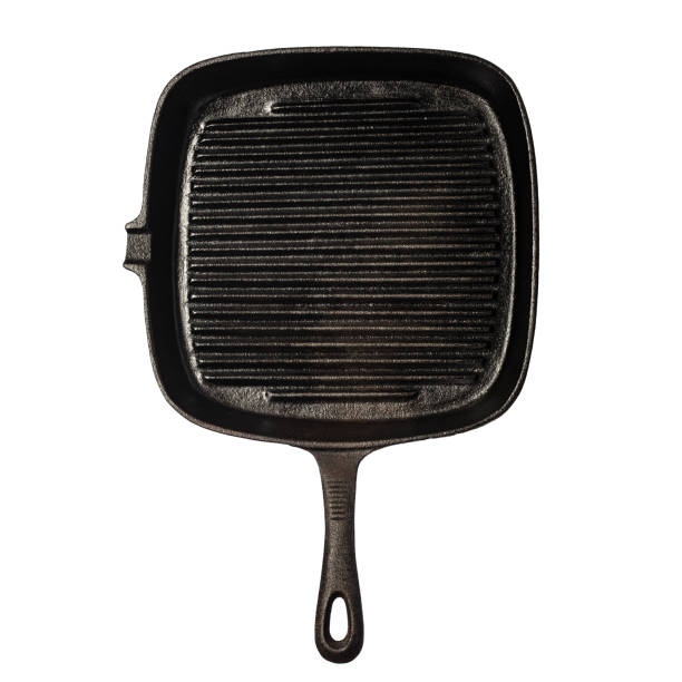 Cast-iron frying pan on white stock photo