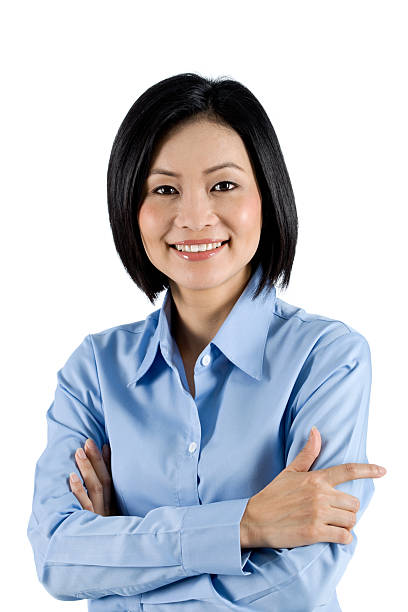 Casual Asian Businesswoman Modern Businessperson With Her Arms Folded. Over 40 More Shots Of This Model From This Shoot: korean culture photos stock pictures, royalty-free photos & images