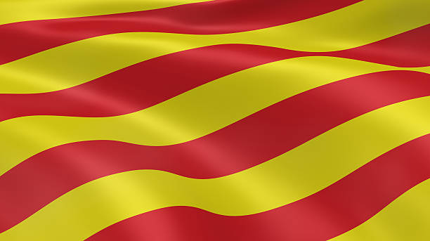 Catalonian flag in the wind Catalonian flag in the wind. Part of a series. catalonia stock pictures, royalty-free photos & images