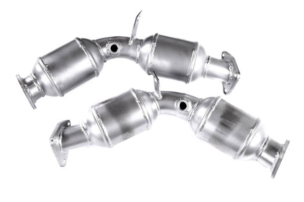 Catalytic converters Catalytic converters isolated over white background plug adapter stock pictures, royalty-free photos & images