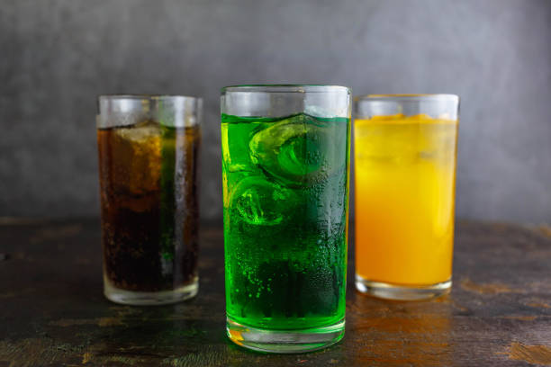 Category soft drink in a glass with ice stock photo