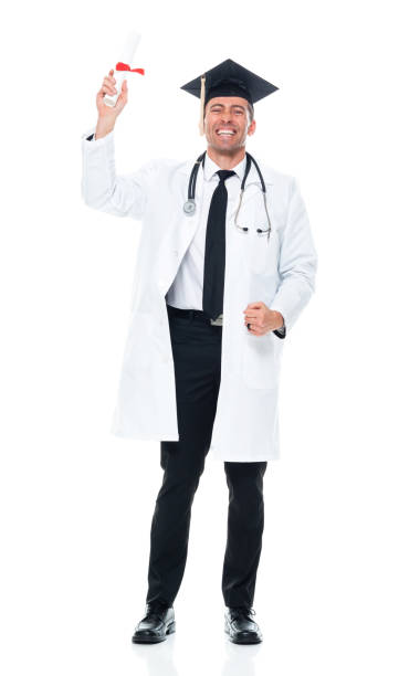 Caucasian male university student standing in front of white background wearing lab coat and holding certificate Full length of aged 40-44 years old with brown hair caucasian male university student standing in front of white background wearing lab coat who is successful and showing award and holding certificate medical degrees stock pictures, royalty-free photos & images