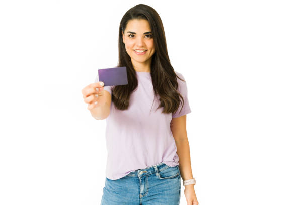 Caucasian woman paying with a credit card stock photo