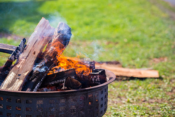 Cauldron Fire on Grass Field stock photo