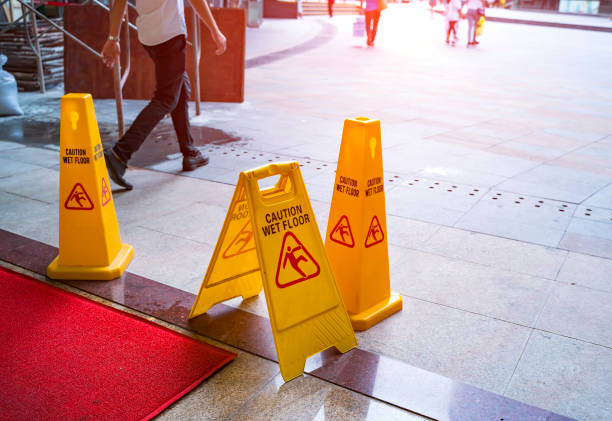 Caution wet floor Caution wet floor slip and fall stock pictures, royalty-free photos & images