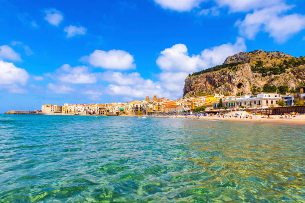 Cefalu beach, Cefalu town, Sicily, Italy stock photo