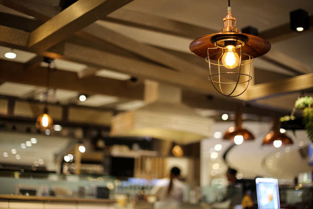 Ceiling light in coffee cafe Ceiling light in coffee shop light bulb filament stock pictures, royalty-free photos & images
