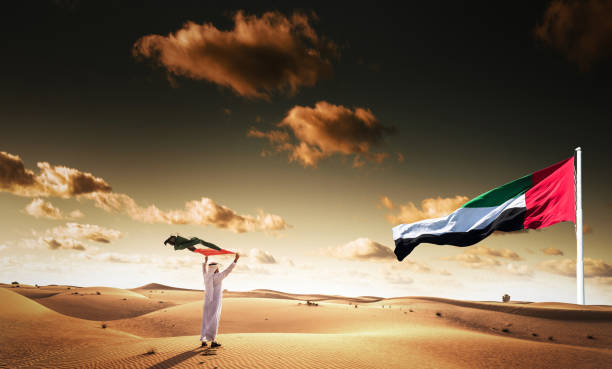 celebrating the UAE national day celebrating the UAE national day united arab emirates flag stock pictures, royalty-free photos & images