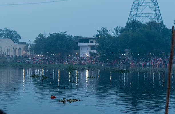 Celebration of Chath Puja Ghaziabad, Uttar Pradesh/India - Nov 2019 : Landscape view of hindon river where people gathered to celebrate chhath puja chhath stock pictures, royalty-free photos & images