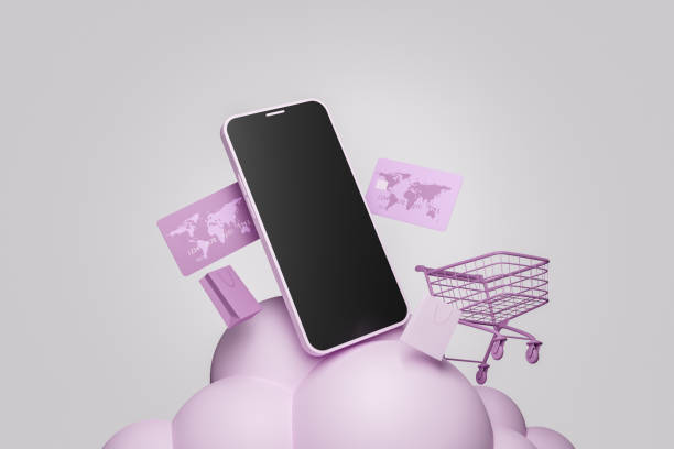 cellphone on a cloud with a shopping cart and credit cards stock photo