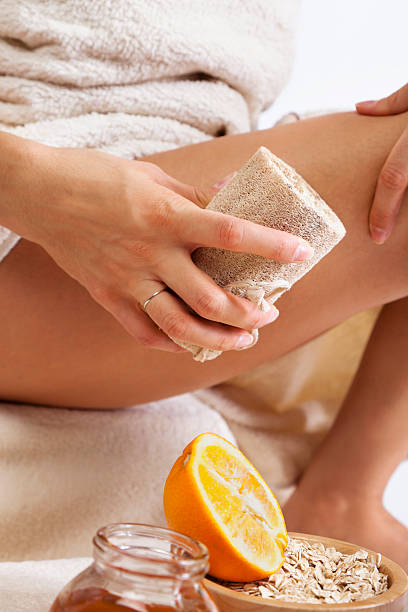Cellulite massage with Organic Natural Sponge, Honey and Orange. stock photo