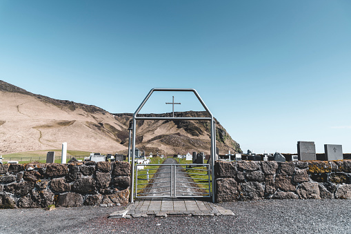Cemetery beside the hills on the south coast of Iceland.