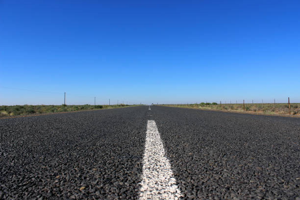 Center line of the R27, long flat country road, Northern Cape, South Africa stock photo
