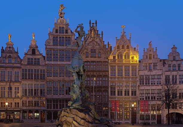 Center of Antwerp Antwerp, Belgium - January 29th 2011:The photo was taken at the \"Grote Markt\".\"Grote Markt\" is the main square in the center of the Antwerp.The photo shows guildhouses from the 16th century and the Brabo fountain in the front. thomas wells stock pictures, royalty-free photos & images