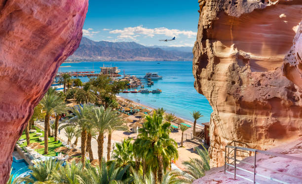 Central public beach and marina in Eilat - famous resort and recreation city in Israel stock photo