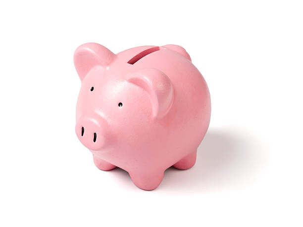 A ceramic light pink piggy bank pink ceramic piggy bank isolated on white coin bank stock pictures, royalty-free photos & images