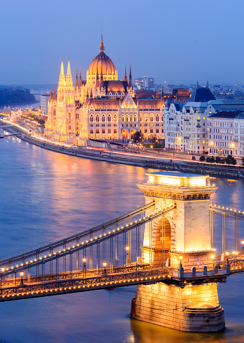 Chain Bridge and Parliament building in Budapest, Hungary at twilight.
