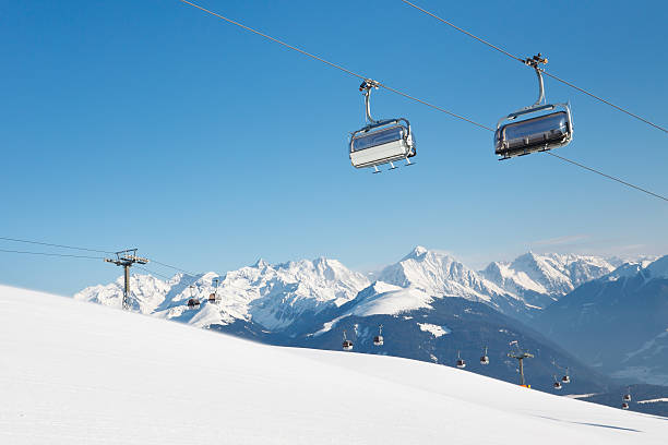 Chairlift at Ski Resort in the Alps stock photo