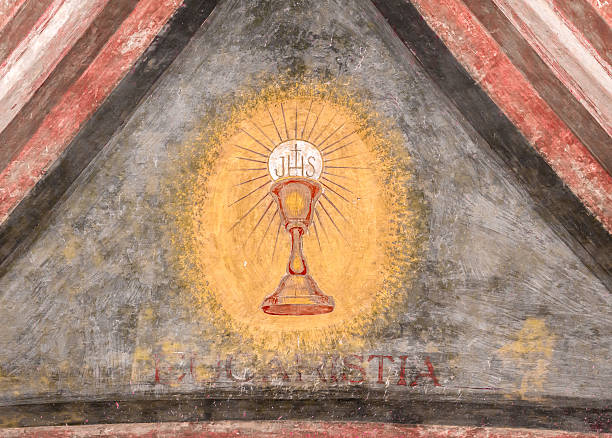 Chalice painted on the wall A fresco depicting the sacred chalice of Jesus. "Eucaristia" in Italian means: Eucharist, Holy Communion, Communion. chalice photos stock pictures, royalty-free photos & images