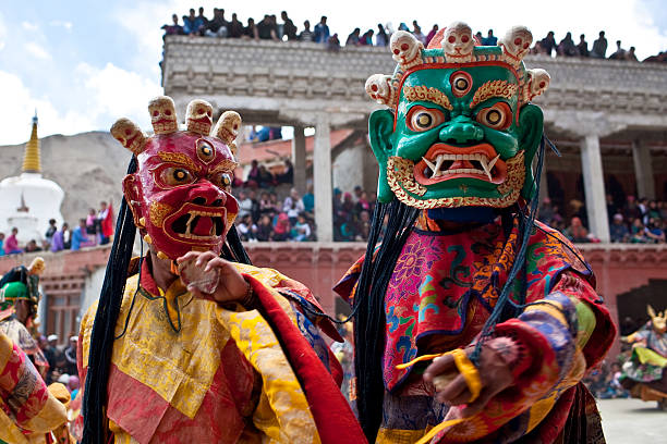 Cham Dance, India Lamayuru, Kargil District, Jammu and Kashmir State, India - June 17, 2012: Cham Dancers during Yuru Kabgyat festival at Lamayuru Gompa. tibetan ethnicity stock pictures, royalty-free photos & images