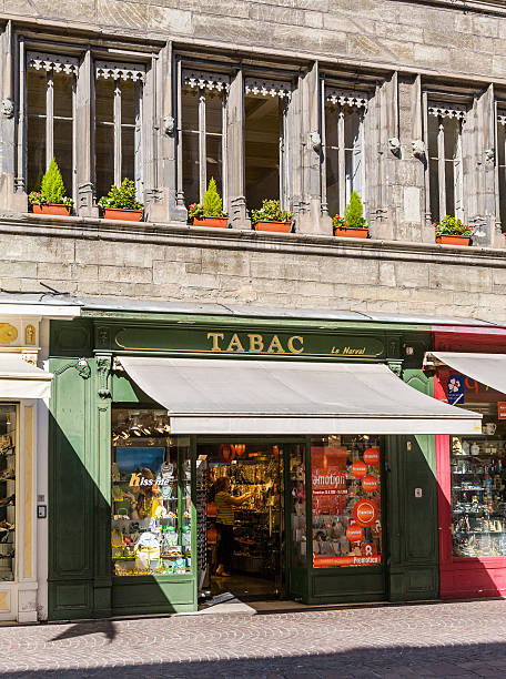 Chambéry (France). Tobacco shop with tourists in the old town stock photo