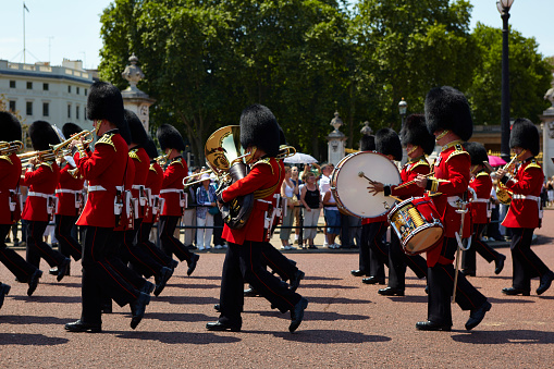 LONDON 10.03.2015. British Royal guards and orchestra perform the Changing of the Guard in Buckingham Palace. Queen's Guard is one of the major tourist attractions in UK.