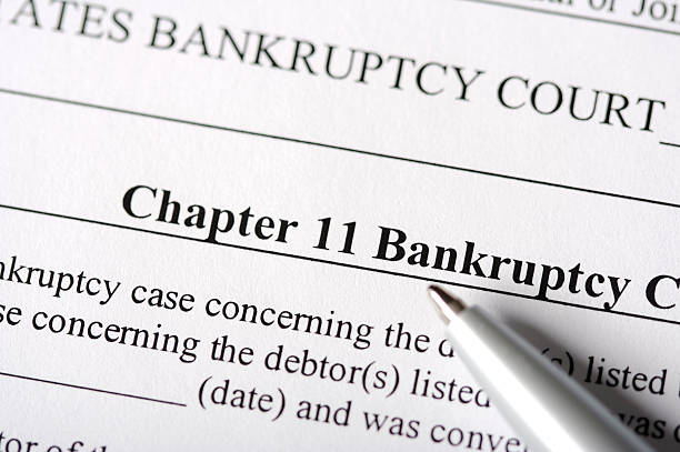 Chapter 11 Bankruptcy Paperwork United States legal documents focused on Chapter 11 Bankruptcy.  bankruptcy stock pictures, royalty-free photos & images