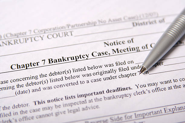 Chapter 7 Bankruptcy Paperwork United States legal documents focused on Chapter 7 Bankruptcy.  bankruptcy stock pictures, royalty-free photos & images