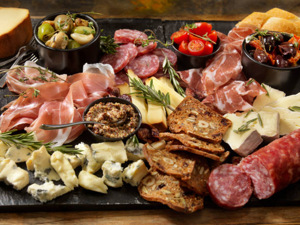 Charcuterie Board Charcuterie Board antipasto stock pictures, royalty-free photos & images