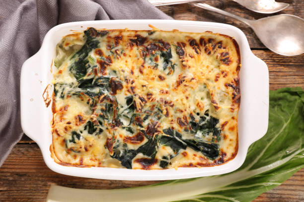 chard gratin with cream and cheese chard gratin with cream and cheese chard stock pictures, royalty-free photos & images