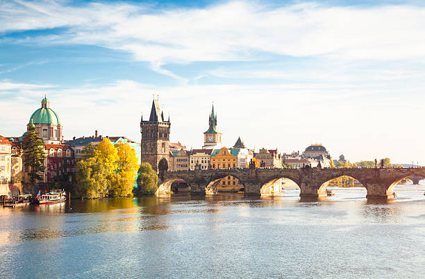 Charles Bridge, Prague, Czech Republic Cityscape of Prague with Charles Bridge in sunny, autumnal day (Czech Republic). vltava river stock pictures, royalty-free photos & images