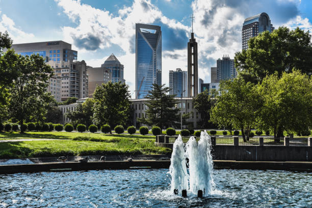 Charlotte city view from water fountain at Marshall Park in Charlotte NC. Charlotte, NC USA. May 23, 2019: Skyscrapers in Charlotte Financial District as seen from Marshall Park marshall photos stock pictures, royalty-free photos & images