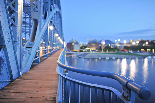 Chattanooga Market Street Bridge at Dusk Downtown Chattanooga Tennessee at Dusk. Shot from the Market Street Bridge. The Tennessee Aquarium can be seen in the background. chattanooga stock pictures, royalty-free photos & images
