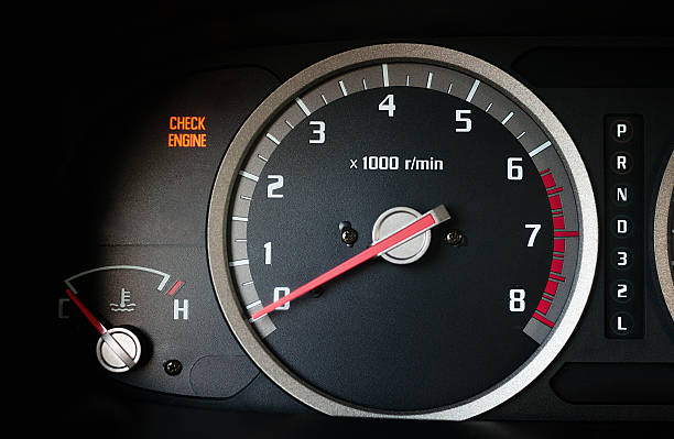 Check engine warning light on on dashboard stock photo