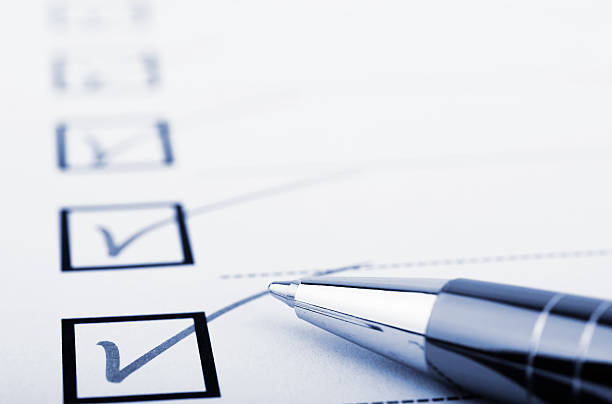 Checklist and pen Checklist and pen checklist stock pictures, royalty-free photos & images