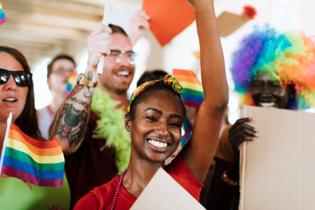 vrolijk gay pride en lgbt festival - gay demonstration stockfoto's en -beelden