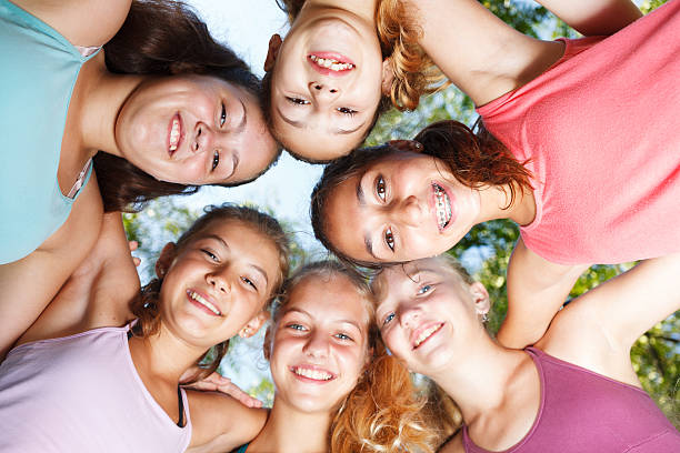 Cheerful teenage girls stock photo