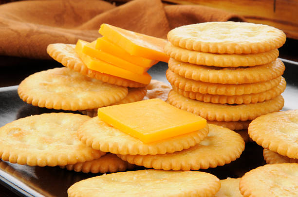 Cheese and crackers Closeup of a snack plate of cheese and crackers cracker snack photos stock pictures, royalty-free photos & images