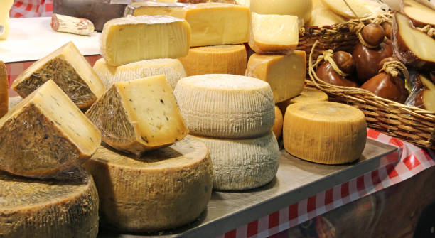 cheese for sale at market stock photo