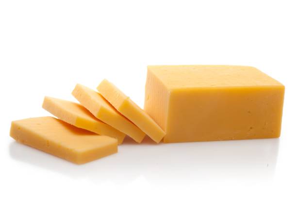 Cheese. Piece and Sliced of Cheddar Cheese cheddar cheese stock pictures, royalty-free photos & images
