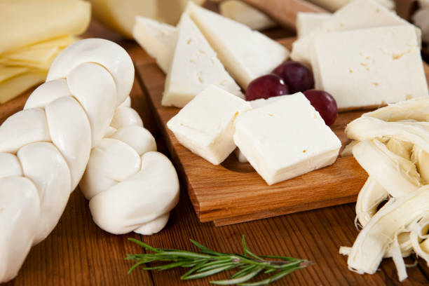 Cheeseboard with assortment of various cheese stock photo