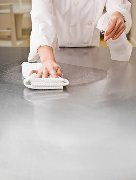 Chef Cleaning Counter stock photo